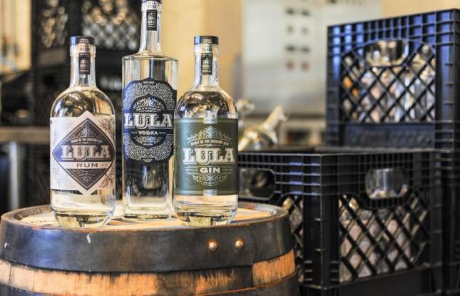 Lula Distillery Rum, Vodka, and Gin bottles