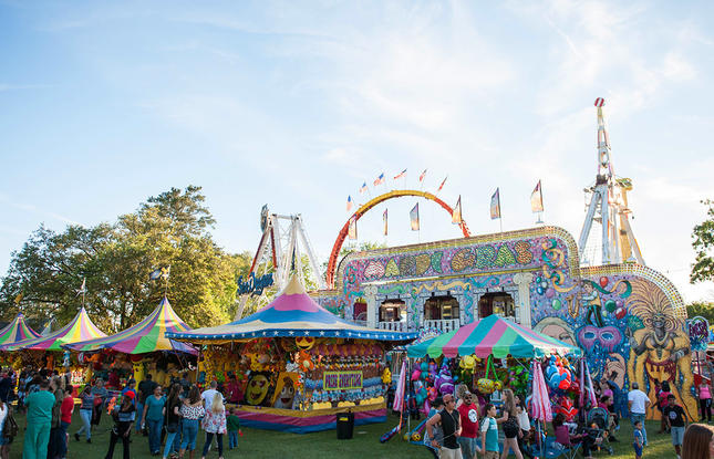Colorful carnival rides and games at the Ponchatoula Strawberry Festival.