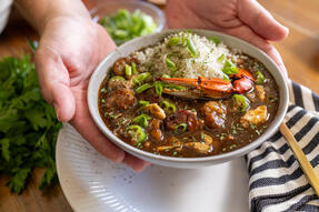 A bowl of gumbo with rice