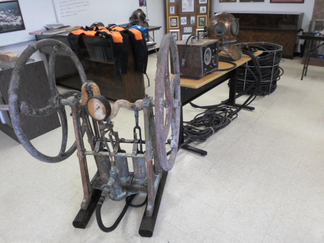 Old hand crank divers air supply pump.