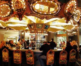 The Carousel Bar at Hotel Monteleone glows at dusk.